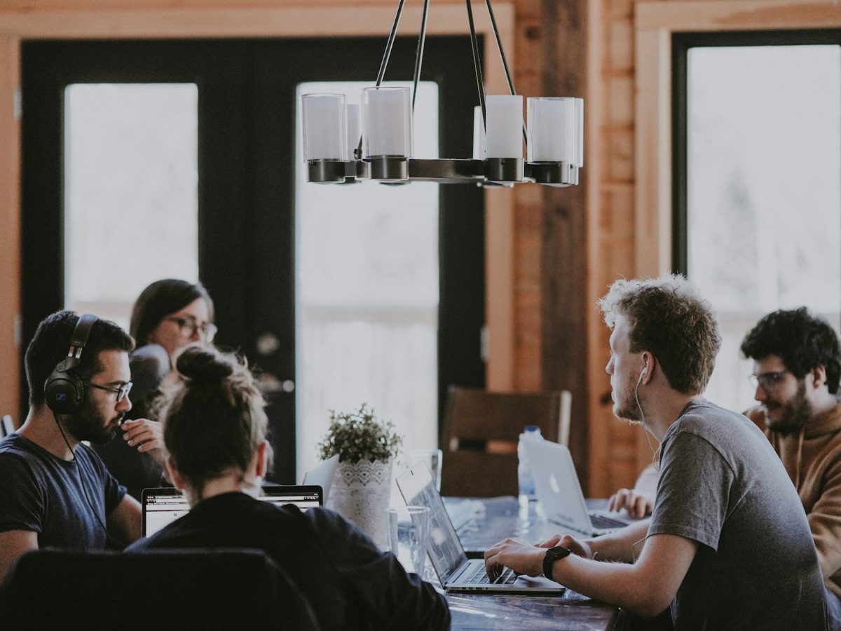 Team working together around a table in an office